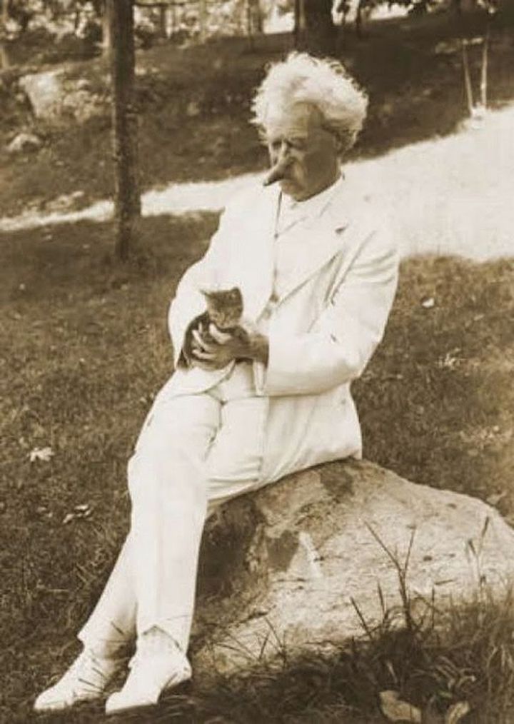 Mark Twain with a kitten.