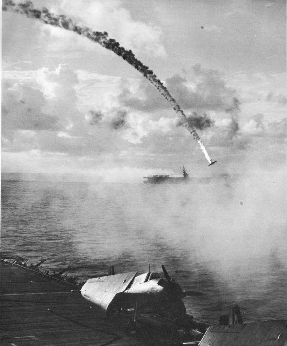 A Japanese plane is shot down during the Battle of Saipan in 1944.