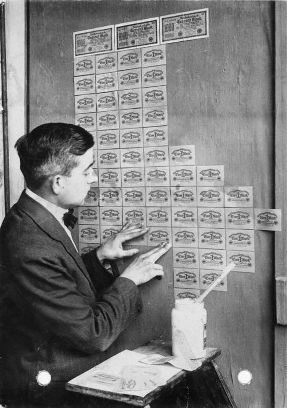 Using banknotes as wallpaper during hyperinflation, Germany 1923.