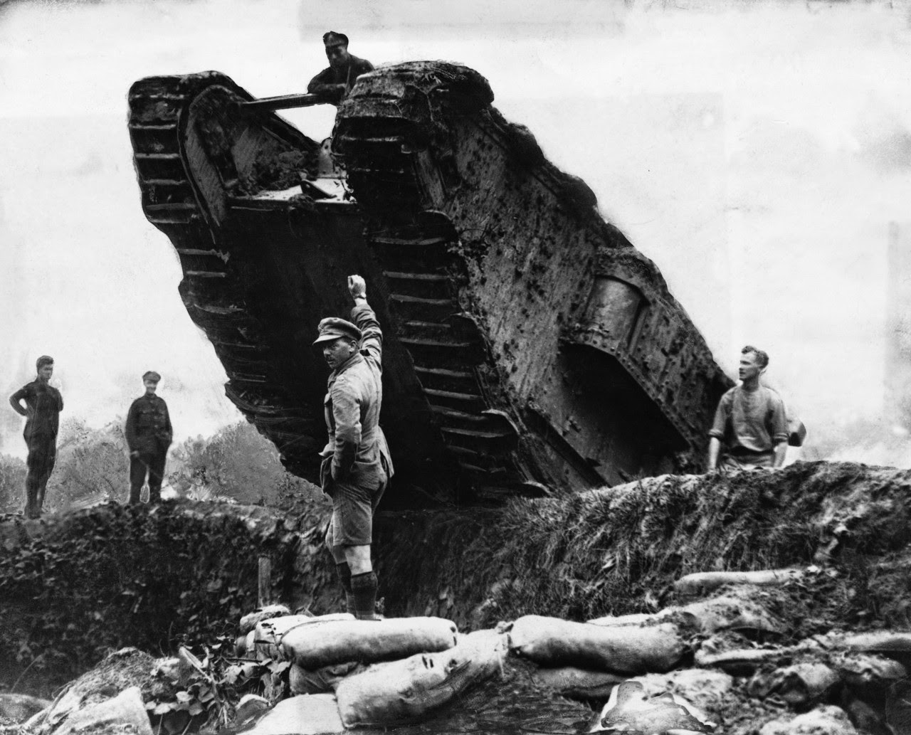British tanks maneuvering trenches during the Battle of Cambrai, the first use of tanks in mass, France, 1917.