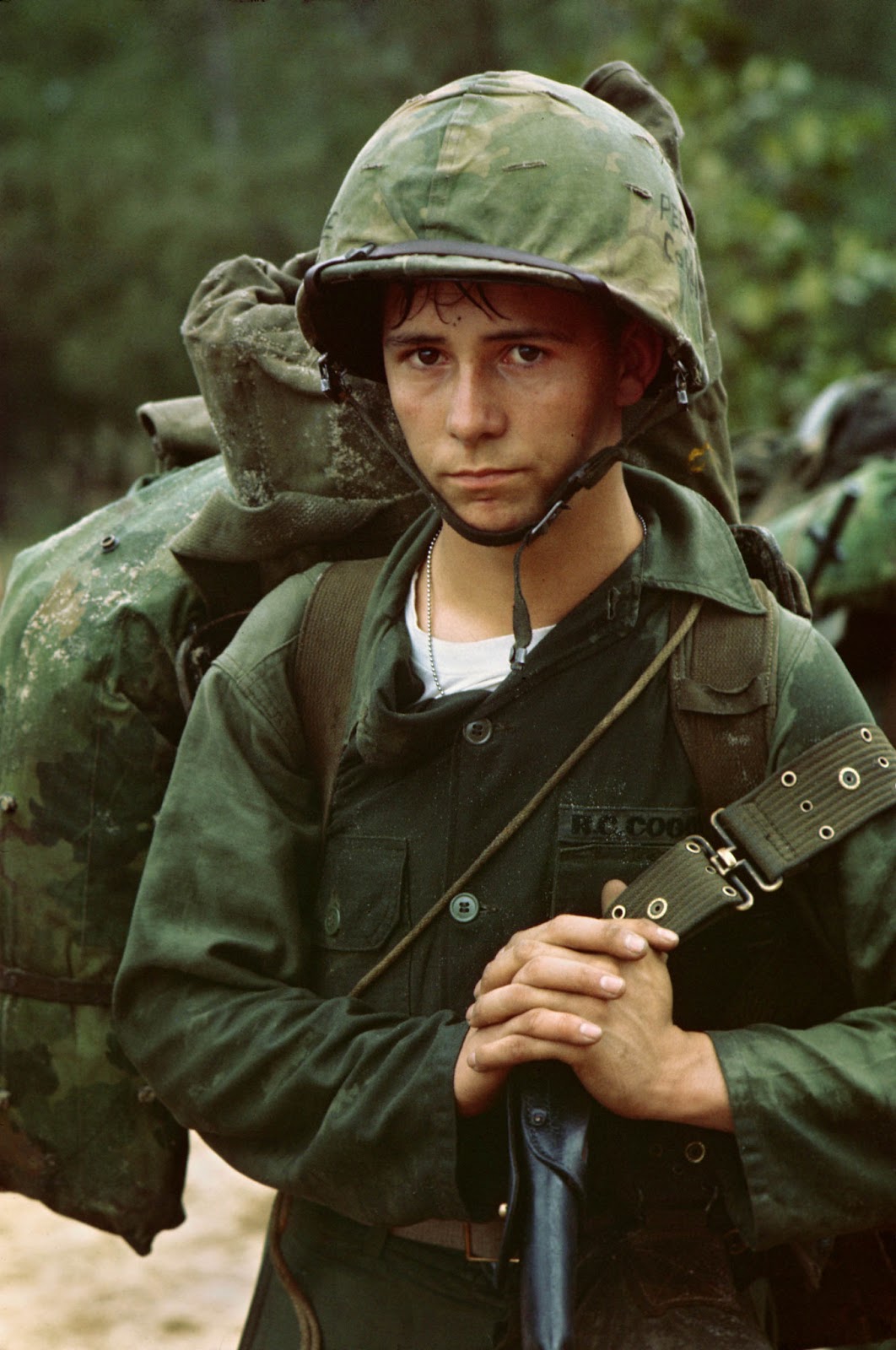 A young private waits on the beach during the Marine landing at Da Nang, Vietnam, 1965.