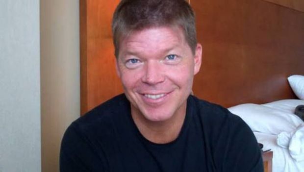 You could see a Starbucks cup with "Rob L." on it. It's Rob Liefeld the co-creator of Deadpool.