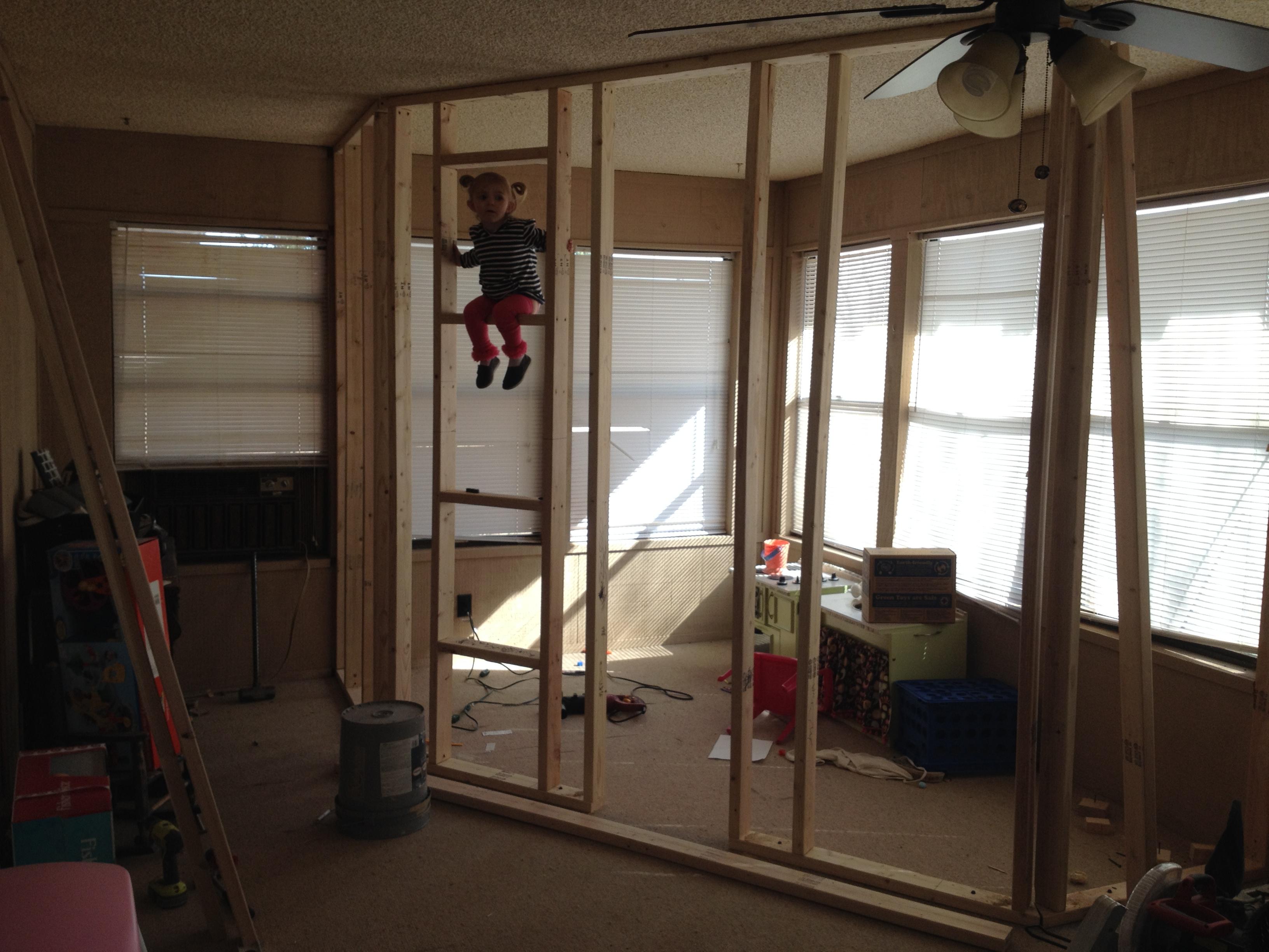 A Father Builds His Kids An Indoor Playhouse With Rope Bridge And A Slide