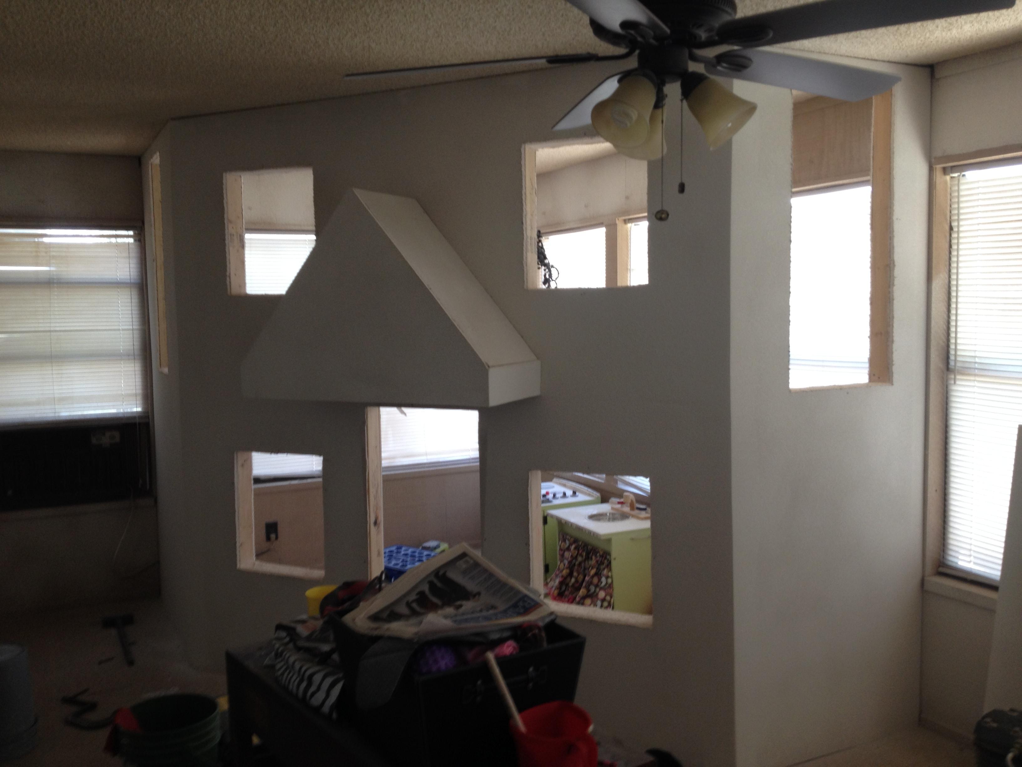 A Father Builds His Kids An Indoor Playhouse With Rope Bridge And A Slide