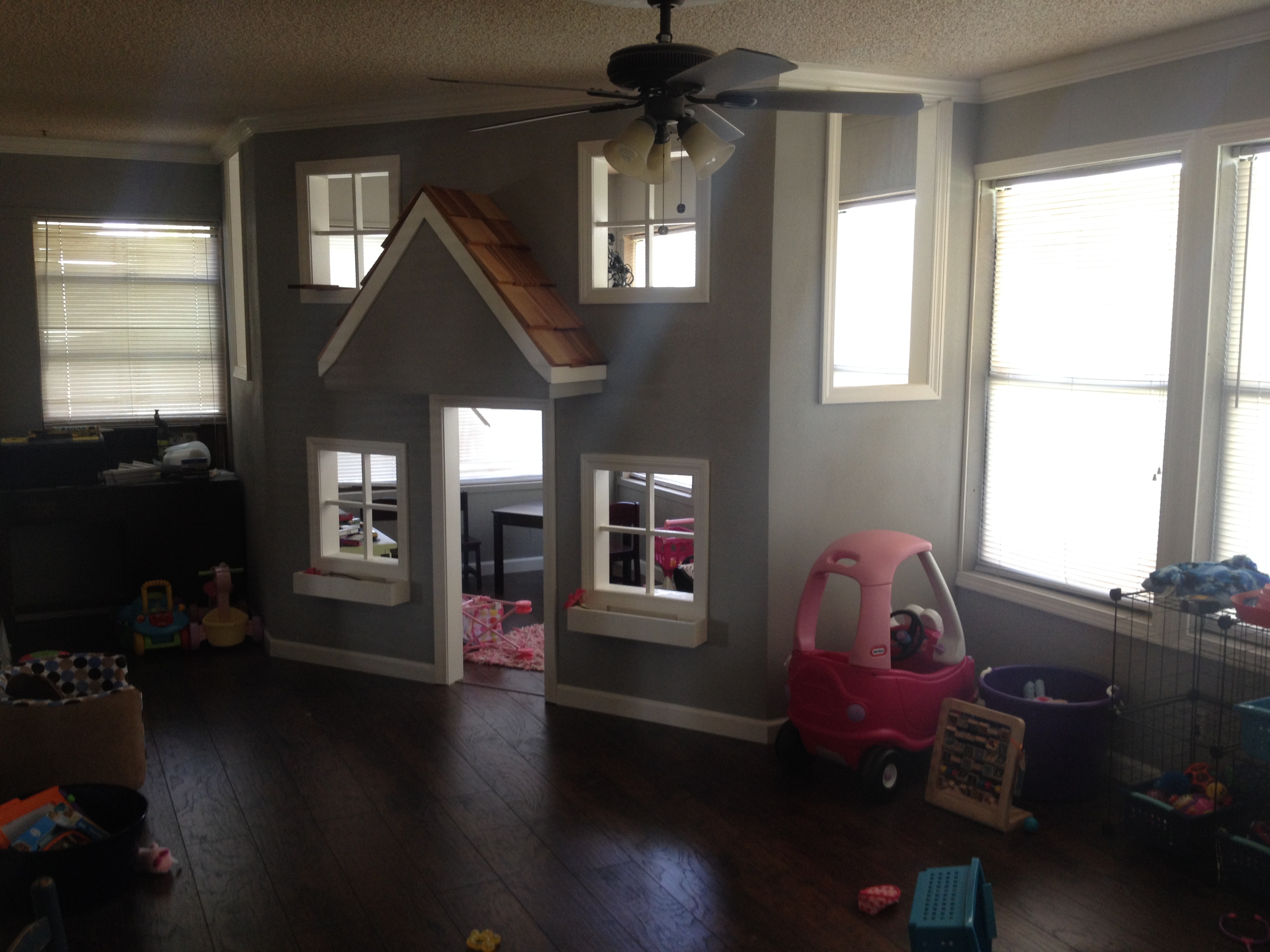 A Father Builds His Kids An Indoor Playhouse With Rope Bridge And A Slide