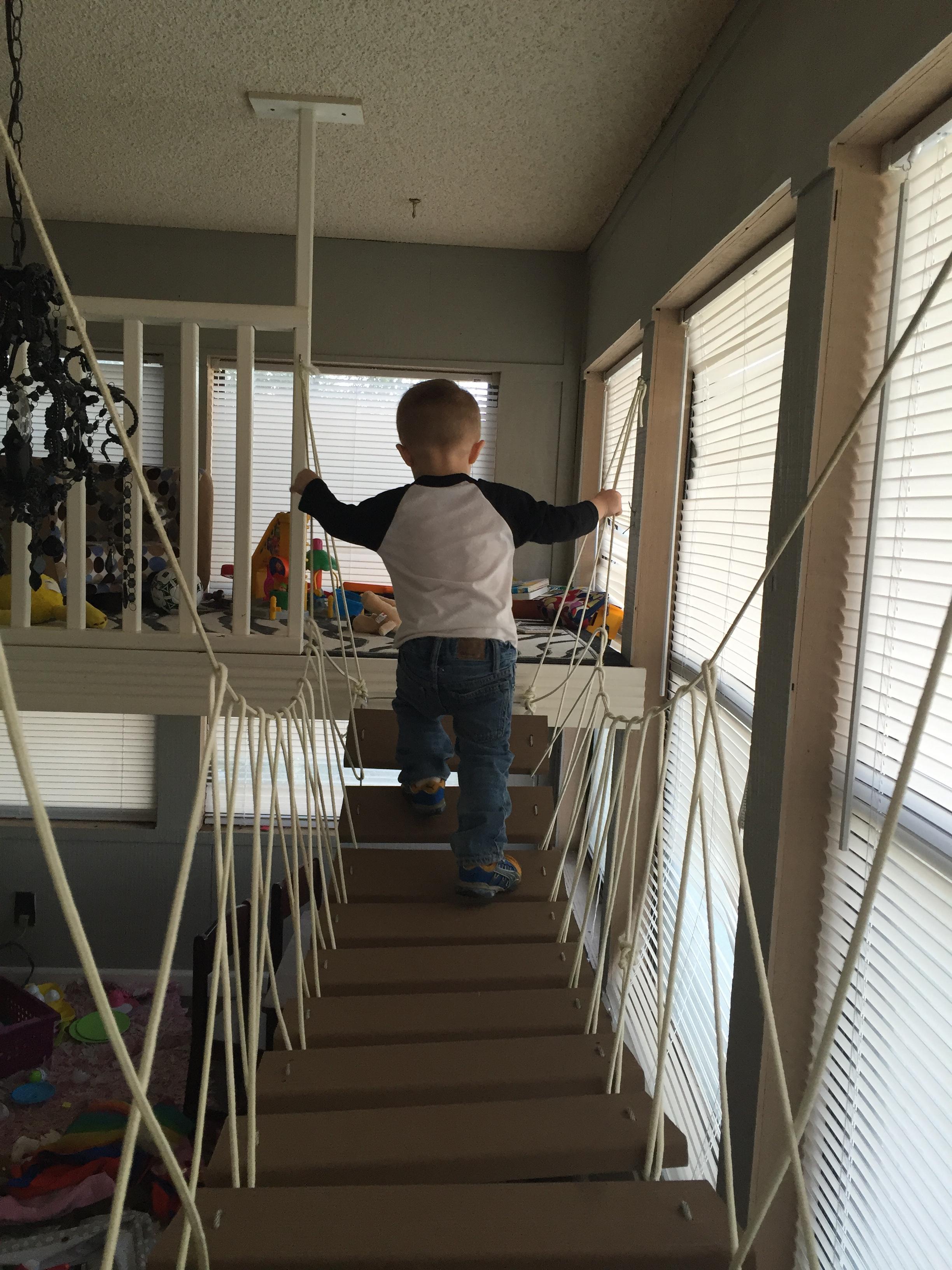 A Father Builds His Kids An Indoor Playhouse With Rope Bridge And A Slide