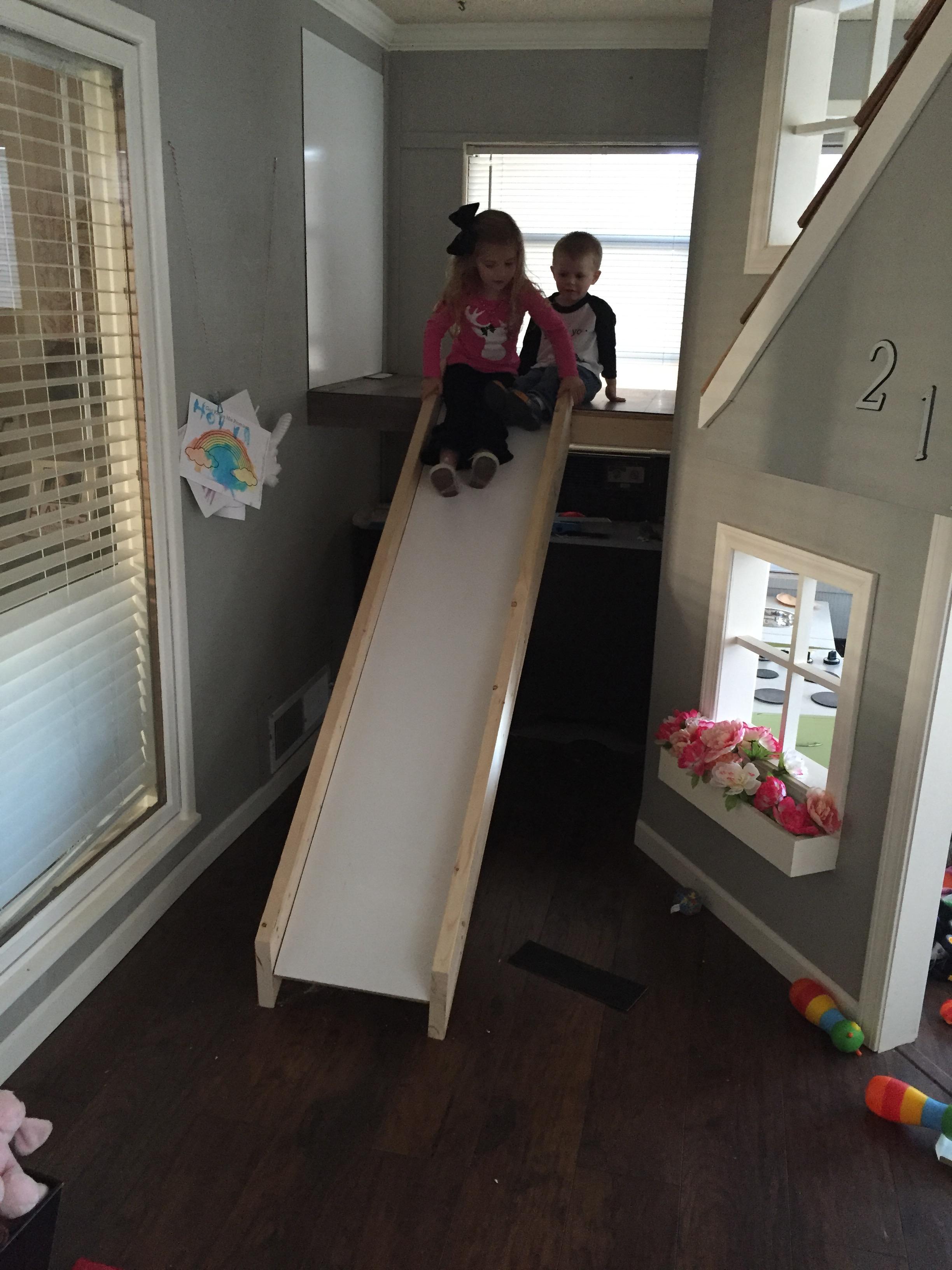 A Father Builds His Kids An Indoor Playhouse With Rope Bridge And A Slide