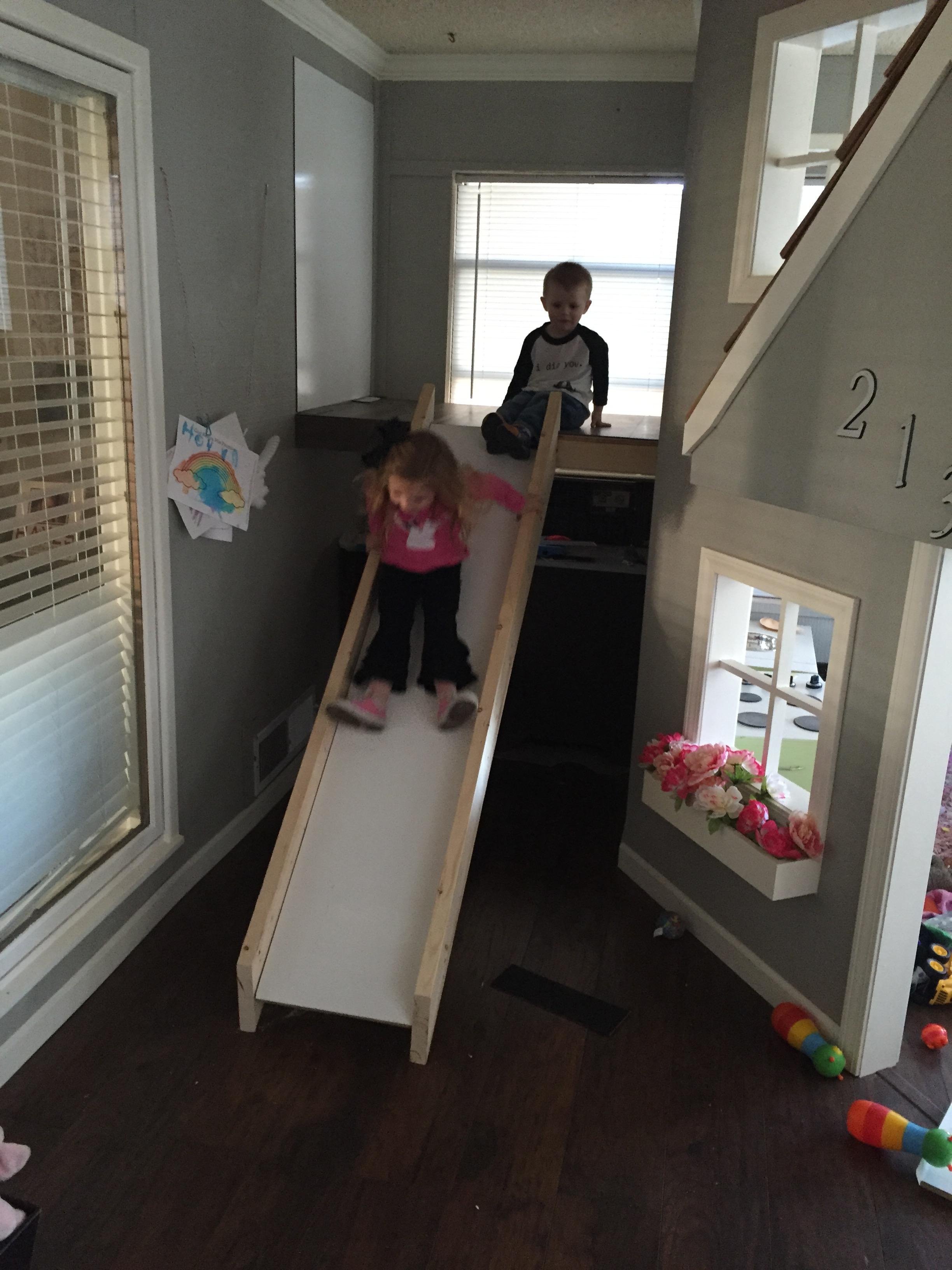 A Father Builds His Kids An Indoor Playhouse With Rope Bridge And A Slide