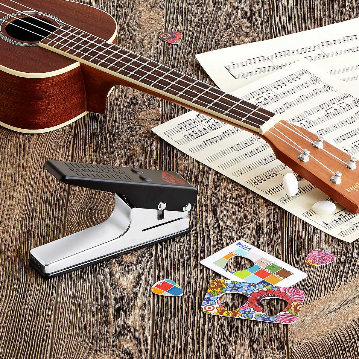Guitar Pick Maker: $25 Lets you make guitar picks at home out of old credit cards, room keys, etc.