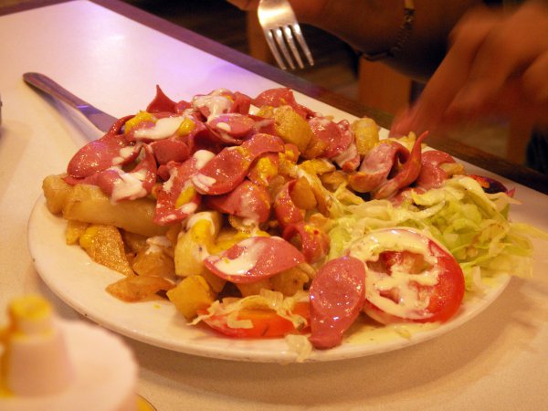 Ecuador- Salchipapas (chopped up hot dogs and french fries)