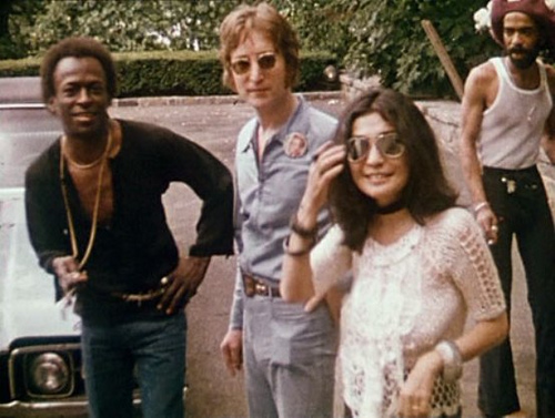 John Lennon and Miles Davis at a party at the former's England estate