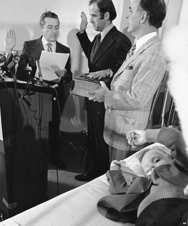 Joe Biden taking his oath of office as senator in 1973 by the bedside of his son Beau