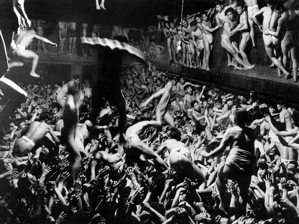 Hundreds of Japanese men attend the sumo try-outs as a result of massive job reductions in Tokyo, 1946.