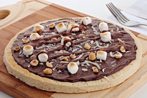 Nutella Pizza. In Dubai, they’ve created a dessert pizza topped with Nutella, crispy marshmallows, & coconut shavings that will make you yell out "Sweet!"