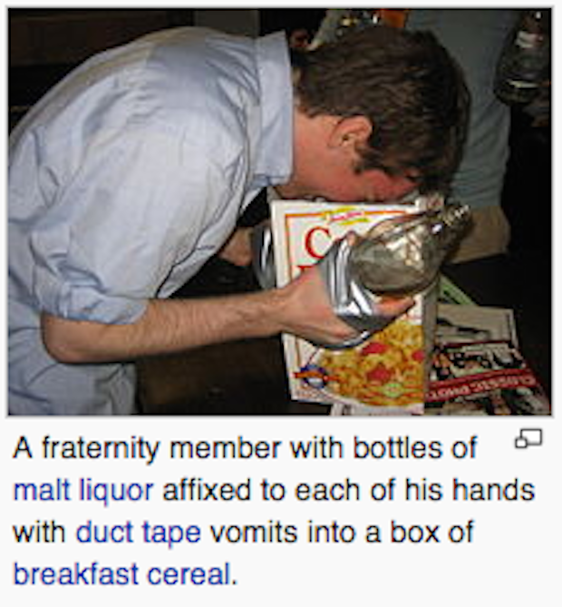 photo caption - A fraternity member with bottles of 5 malt liquor affixed to each of his hands with duct tape vomits into a box of breakfast cereal.