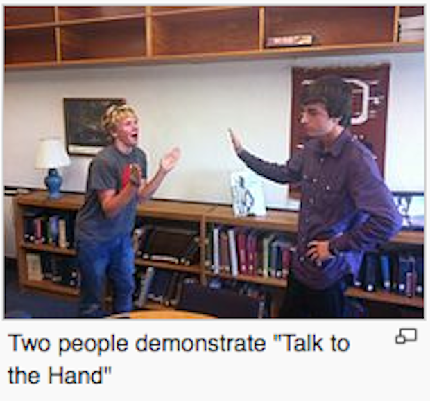someone talking mean - Two people demonstrate "Talk to the Hand"