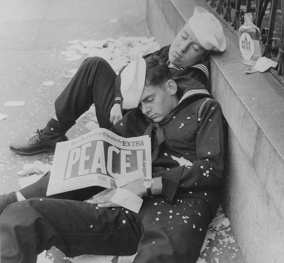 Two sailors celebrating the end of WW II.