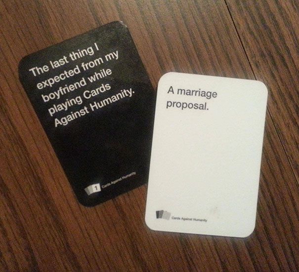 Girl playing Cards Against Humaniy nearly missed her boyfriend proposed by this.