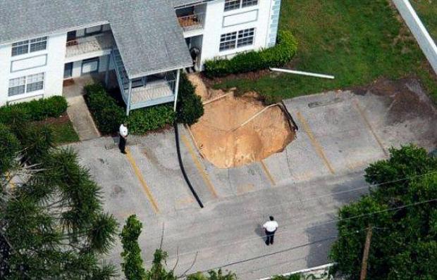 In the place where her car was parked there now was a hole so big if you reinforced it and filled it with water it could be a pool.