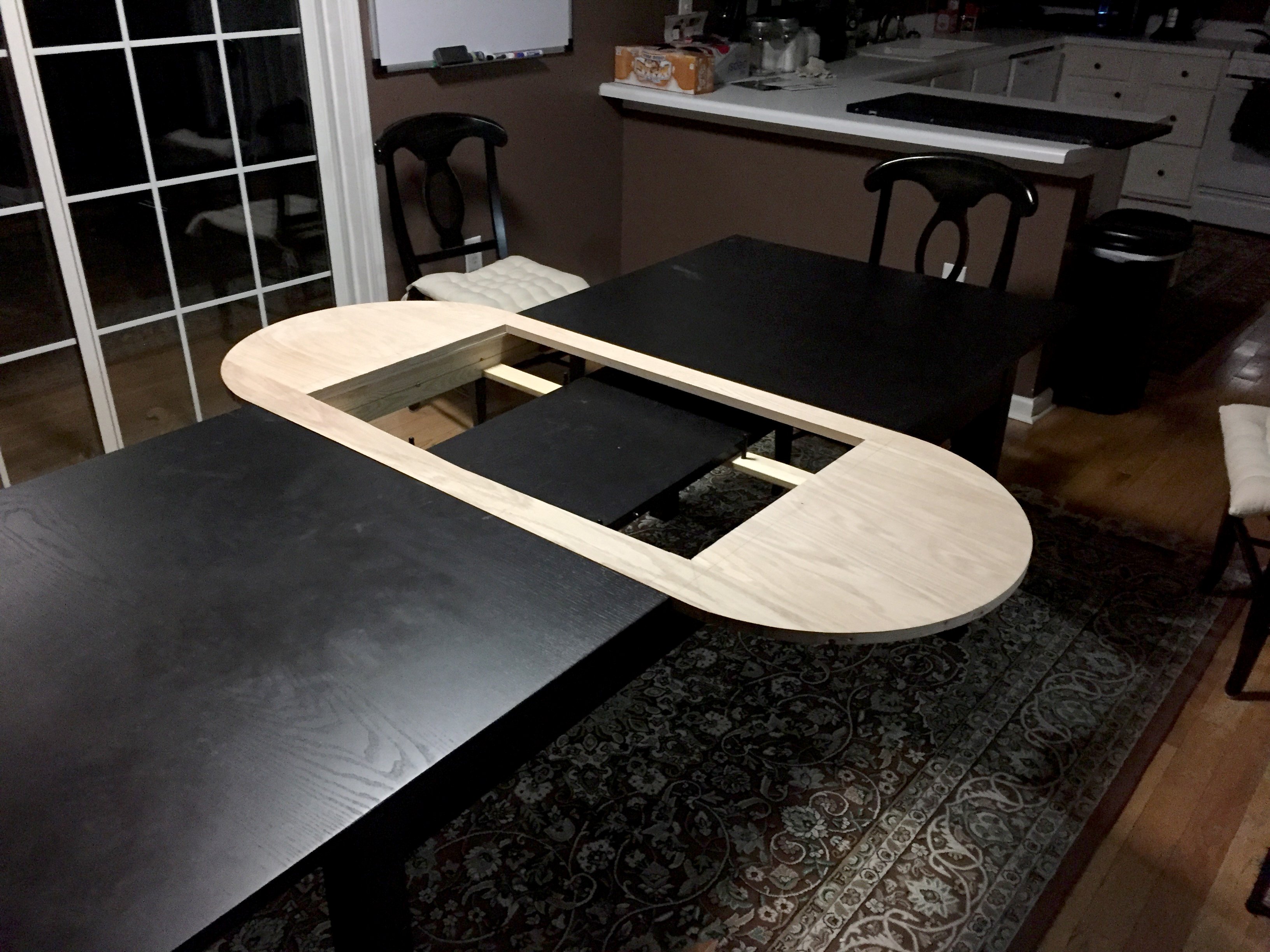 "The leafs for the table have little pegs and holes so that everything lines up. Because I wanted this to be an inset AND a free standing table I decided to only do the holes so that there wouldn't be any pegs sticking out of the finished table."