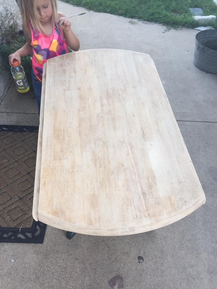 "This is after the surface was striped. Luckily, it was actual hard wood under that awful veneer, and not MDF."