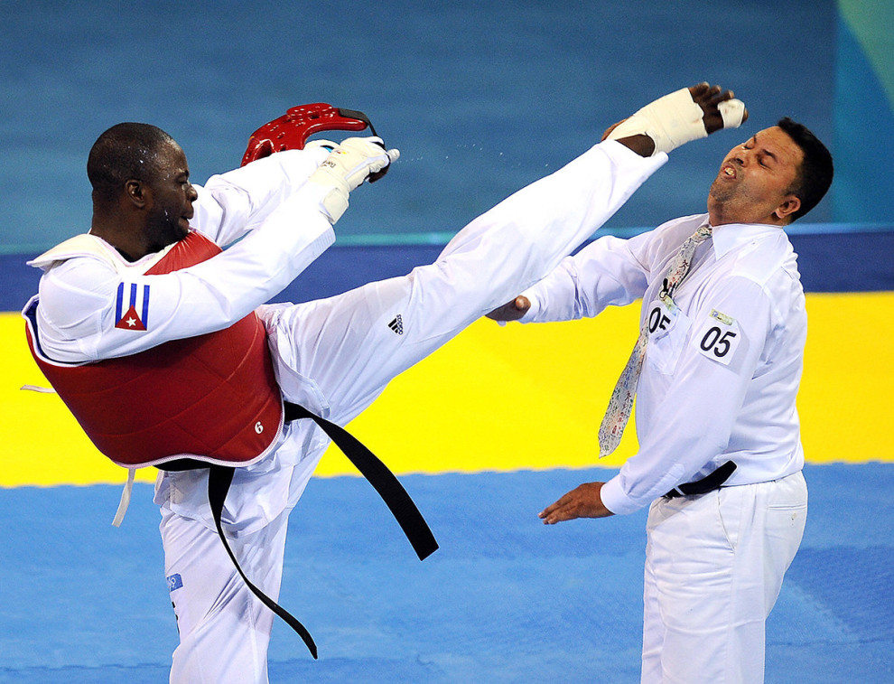 Angel Valodia Matos of Cuba was not very happy after referee Chakir Chelbat disqualified him from his bronze medal contest in the men’s +80kg taekwondo competition of the 2008 Beijing Olympic Games. In one swift kick, Matos lashed out in anger, landing a hard blow to the center of the ref’s face. Needless to say, Matos has since been banned from ALL World Taekwondo Federation events for the rest of his life.