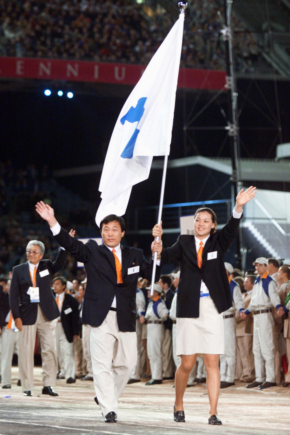 During the Athletes Parade in the opening ceremony of the 2000 Olympic Games in Sydney, Jang Choo Pak of North Korea and Eun-Soon Chung of South Korea walked hand in hand carrying a special flag depicting the Korean peninsula — a gesture of peace and unification never before shown between the two feuding nations.