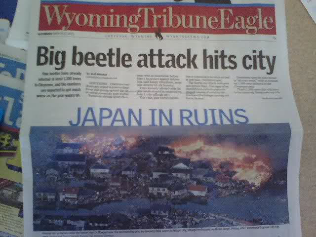 newspaper - Wyoming Tribune Eagle Big beetle attack hits city wat Japan In Ruins