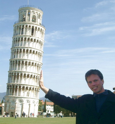 How come every tourist in Pisa has to pretend he's holding the crooked tower?