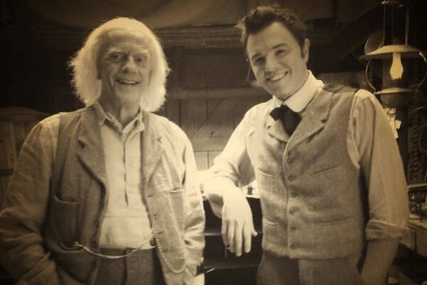 A Million Ways To Die In The West is a movie made by Seth MacFarlane in which he also plays the main hero. When Seth is riding his horse he sees something suspicious... and it turns out to be Doc Brown (you know Back to the Future) working on his time machine.