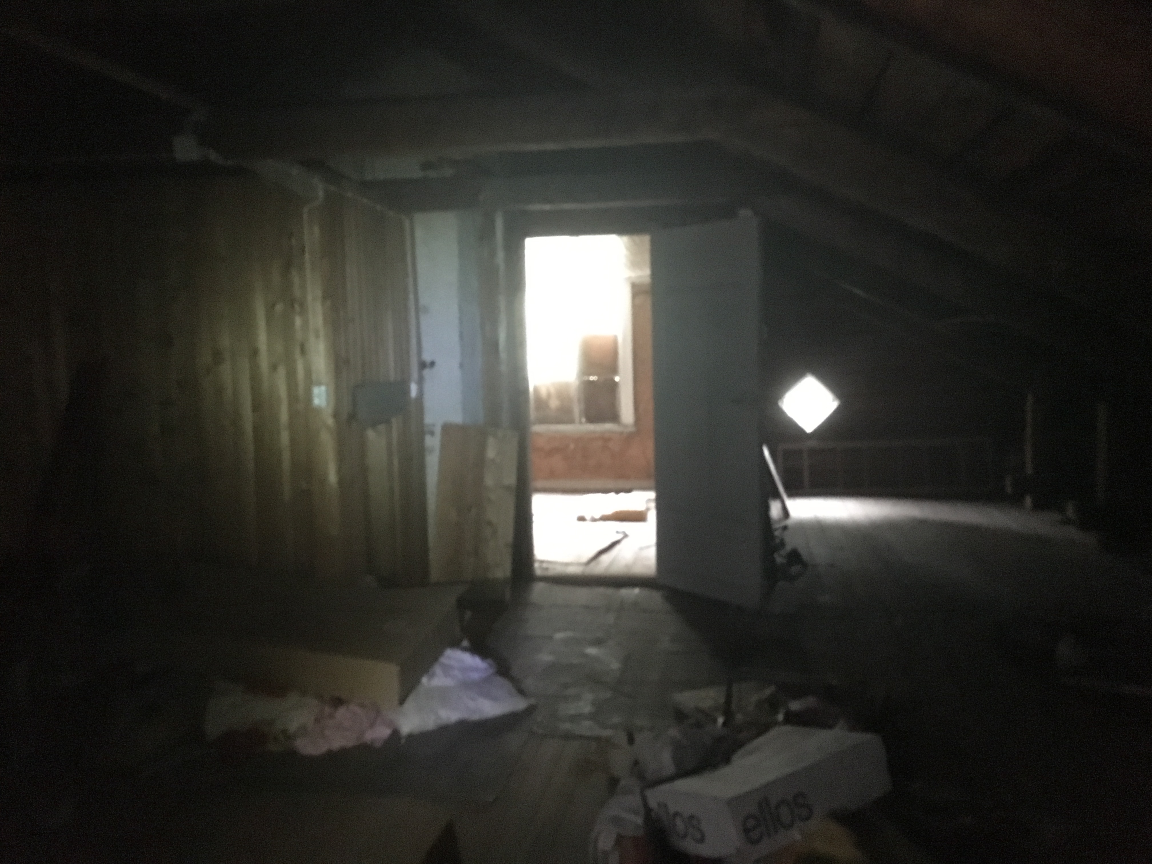 The attic with the small room in one end.