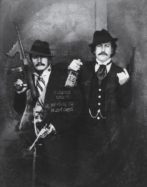 Pablo Escobar and his cousin Gustavo posing as old school gangsters, 1980s.