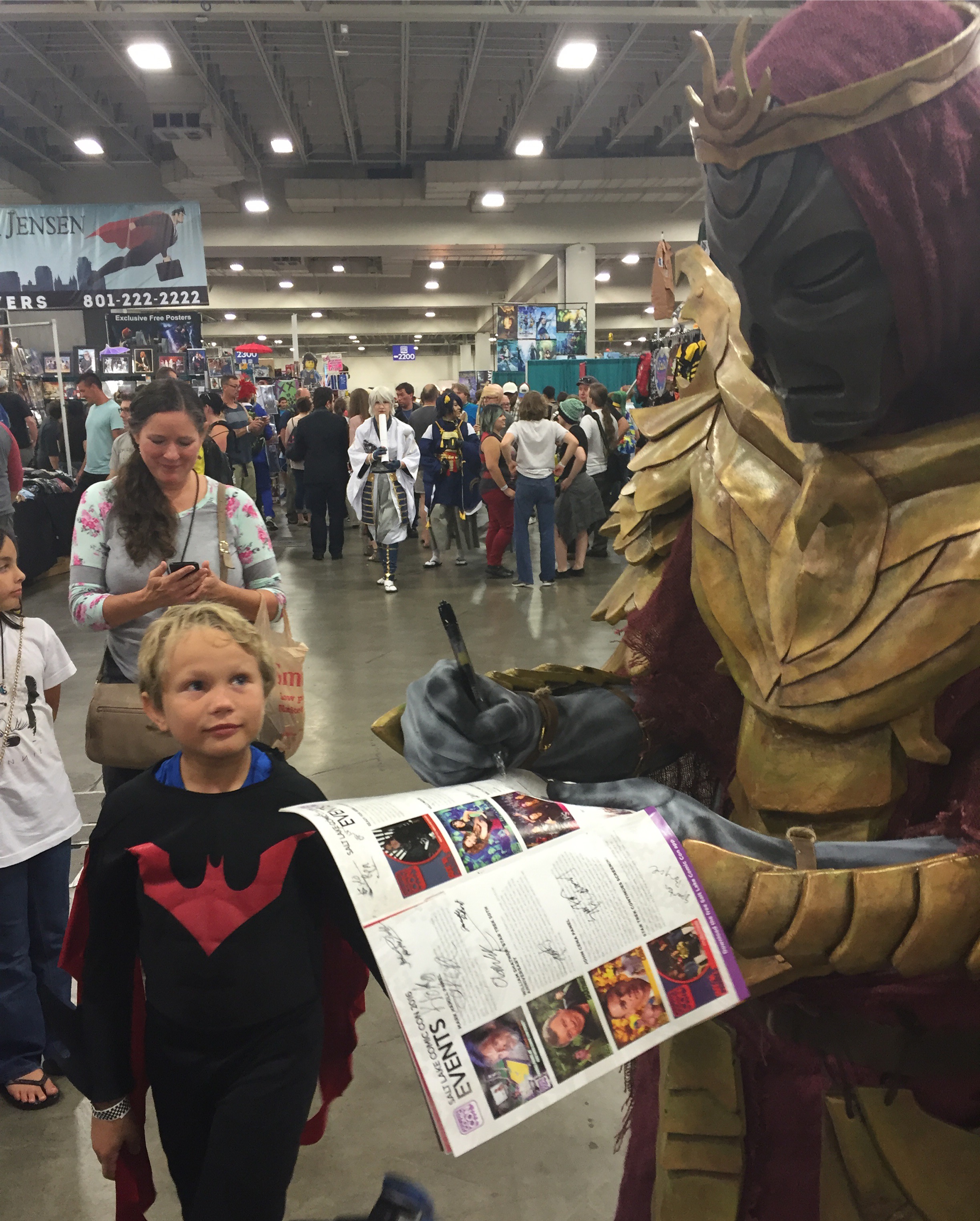 "And finally, here's Elling at the con with this lil guy who wanted his autograph. It ended up being one of our favorite moments from the con (I mean, look at his face!! It's heartwarming!) This kinda stuff is what makes cosplaying worth the time, money, and effort. I'm so happy I caught this on camera!"