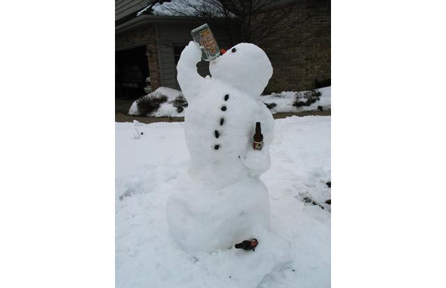 Snowman drinking beer in Minnesota