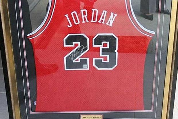 An autographed Michael Jordan jersey.  Although he says he wouldn't do it again, Moore told he misses "cocaine, strippers and fast cars," adding: "I had to give everything back and I now drive a shoebox Falcon but I'm happier this way as I've realized my family and friends are my biggest treasures."