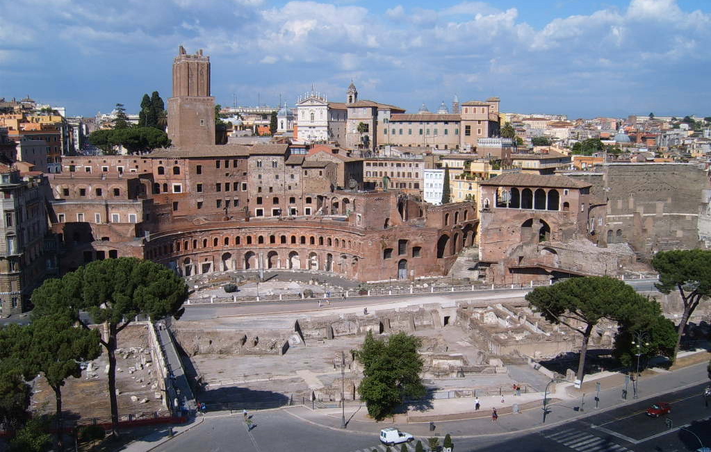 The first shopping center is Trajan's Forum created in 2nd century's Rome. So they're not a new thing- they have about 19 centuries.