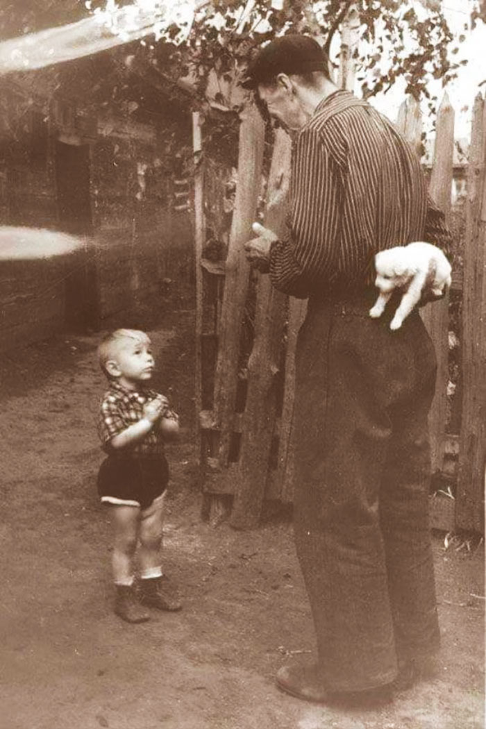 A few moments before this kid gets a puppy, 1955.