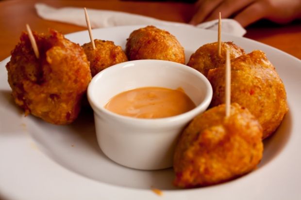 Barbados. Bajan fish cakes are a hit in Barbados and other Caribbean countries. Made from salted fish, flour, baking powder, and herbs, this popular snack can be purchased in open-air movie theaters.