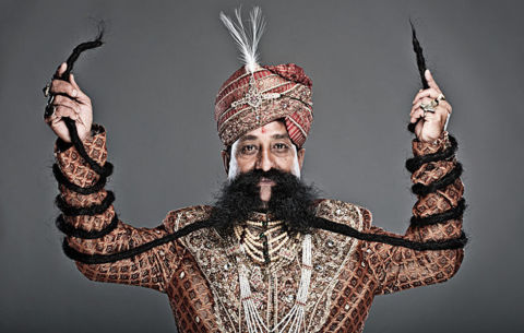 Longest Mustache. Ram Singh Chauhan's mustache is the longest, at 14 feet. The Indian man's facial hair was measured in Rome, Italy, on March 4, 2010.