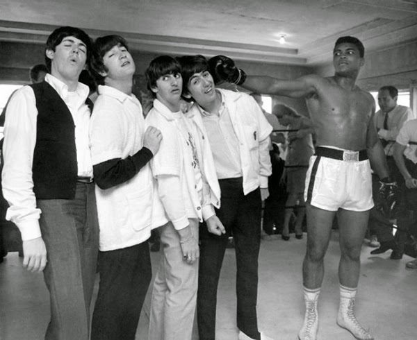 The Beatles goofing around with Cassius Clay.