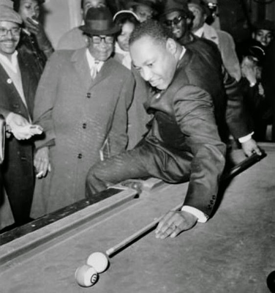 Martin Luther King playing a game of pool, Chicago.