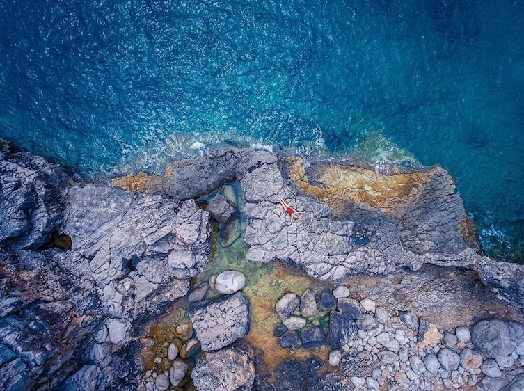 An aerial view of the coast of the Adriatic Sea near Montenegro.   Open Travel category.