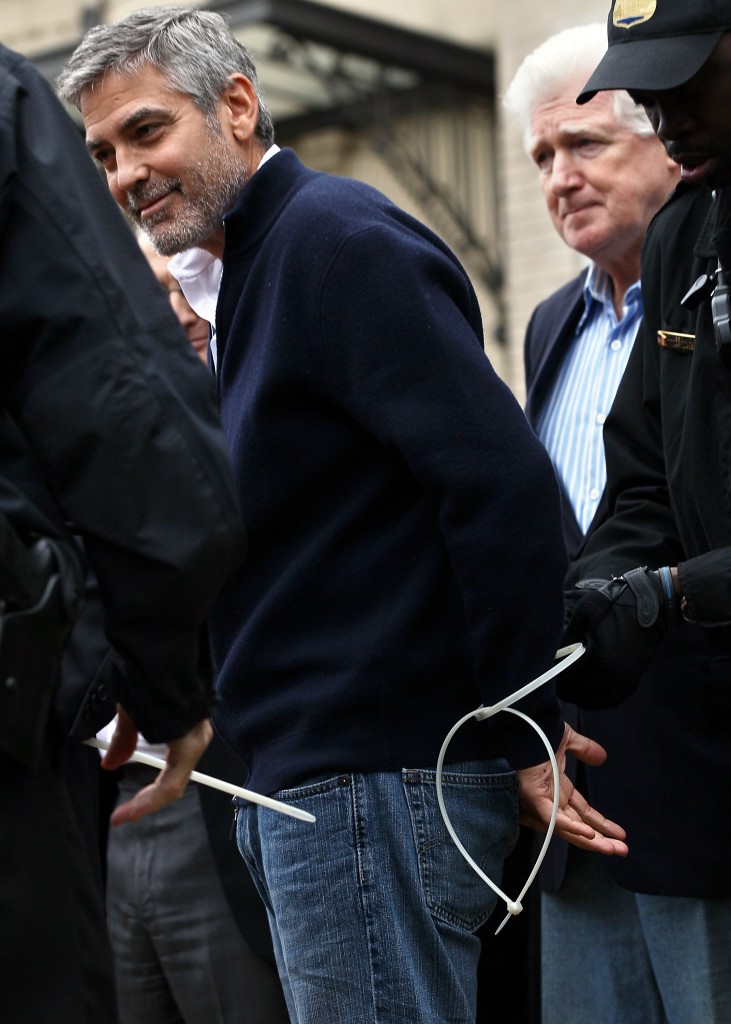 George Clooney arrested while protesting outside the Embassy of Sudan in 2012. Sudan was in the midst of an ugly internal conflict and was accused of atrocities to its people.