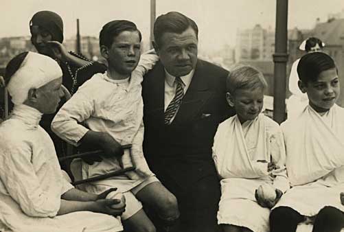 Babe Ruth visiting sick and hurt children at a New York City hospital in 1942. He did this and other appearances for children quite often throughout his stardom.