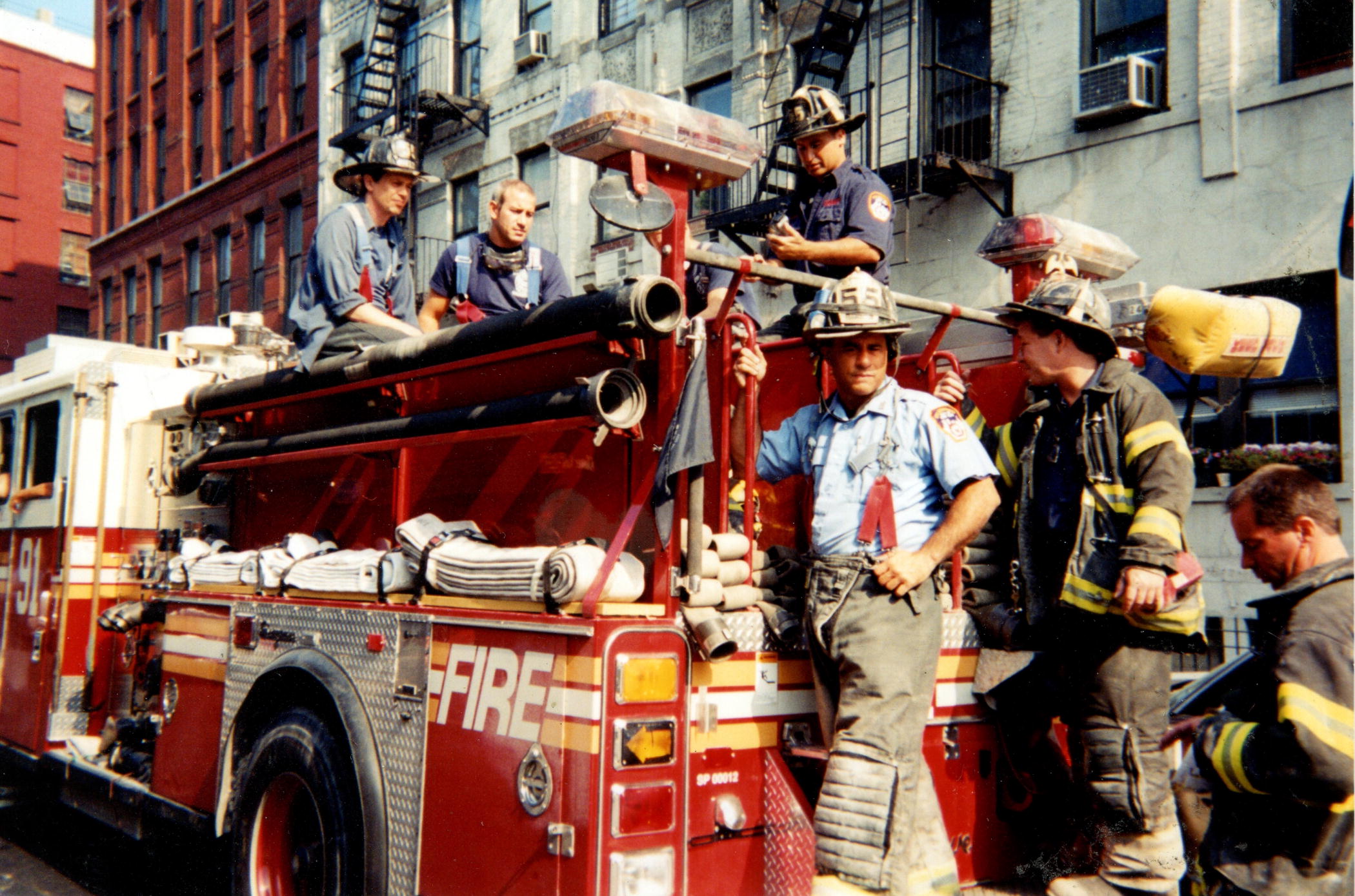 Steve Buscemi (top left) and his firefighting crew return from a call in NYC in late 2001. After 9/11, Buscemi volunteered to help the FDNY and stayed with them for a good while. He never sought notoriety for this and did it rather quietly at the time. He had been a trained and experienced fire fighter before becoming an actor.