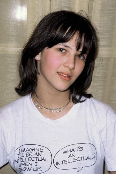 Sophie Marceau hanging out at home in France sometime in the mid 1980s.