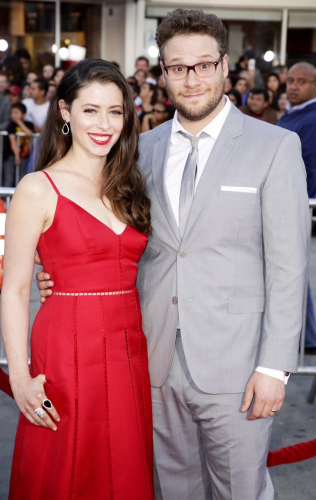 Seth Rogen and his wife Lauren Miller attend the premier of the film Neighbors in 2014.