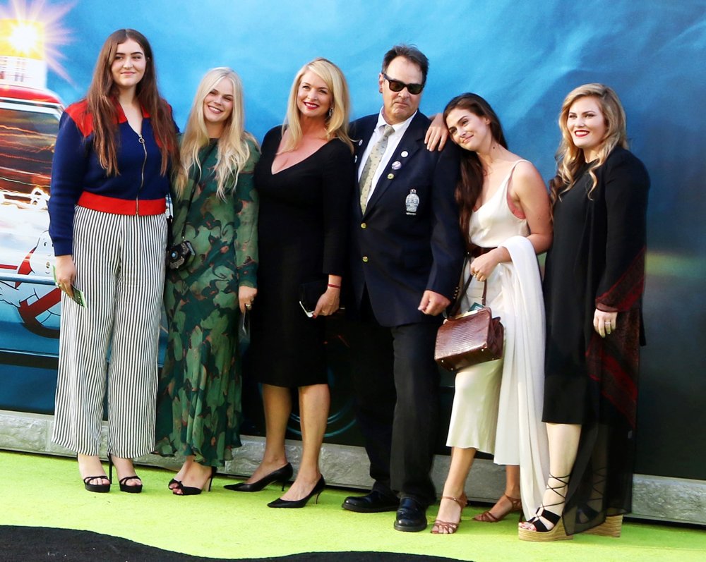 Dan Aykroyd with his wife Donna Dixon and his 3 daughters, Belle Aykroyd, Stella Aykroyd, and Danielle Aykroyd (white dress).