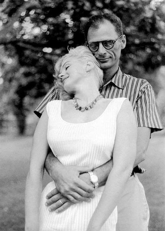 Marilyn Monroe and her third husband Arthur Miller share an embrace in 1961. Monroe was married 3 times and stayed with Miller the longest at 5 years.