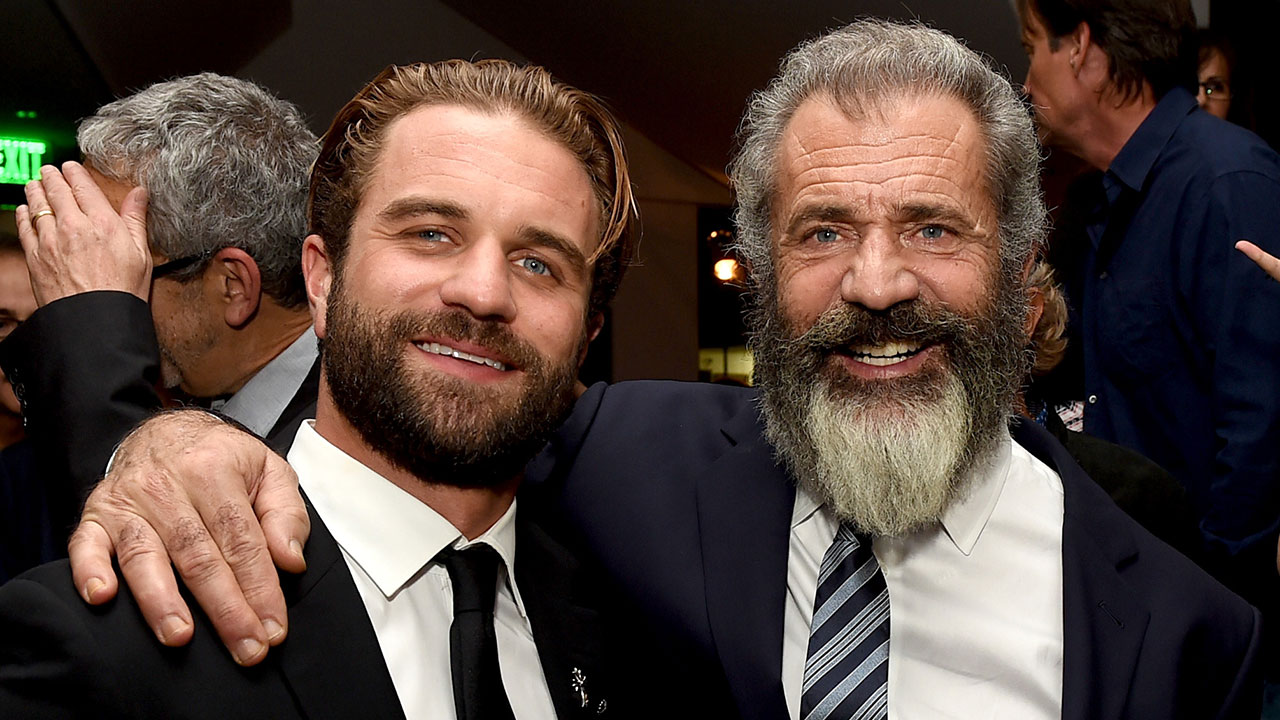 Mel Gibson and his son Milo attending an event for Hacksaw Ridge in 2016. Mel has 8 children total, about to be 9.
